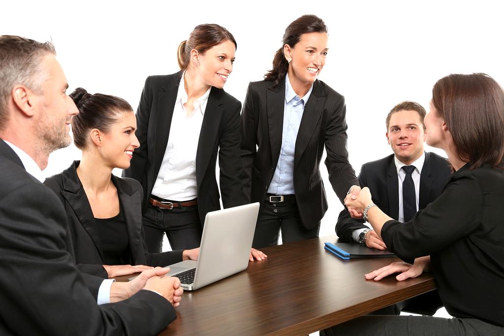 Marketers collaborating with influencers at a business meeting